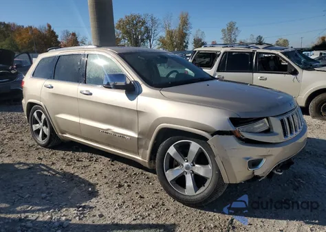 2014 Jeep Grand Cherokee Overland z USA, uszkodzony, nr VIN 1C4RJFCT9EC147999